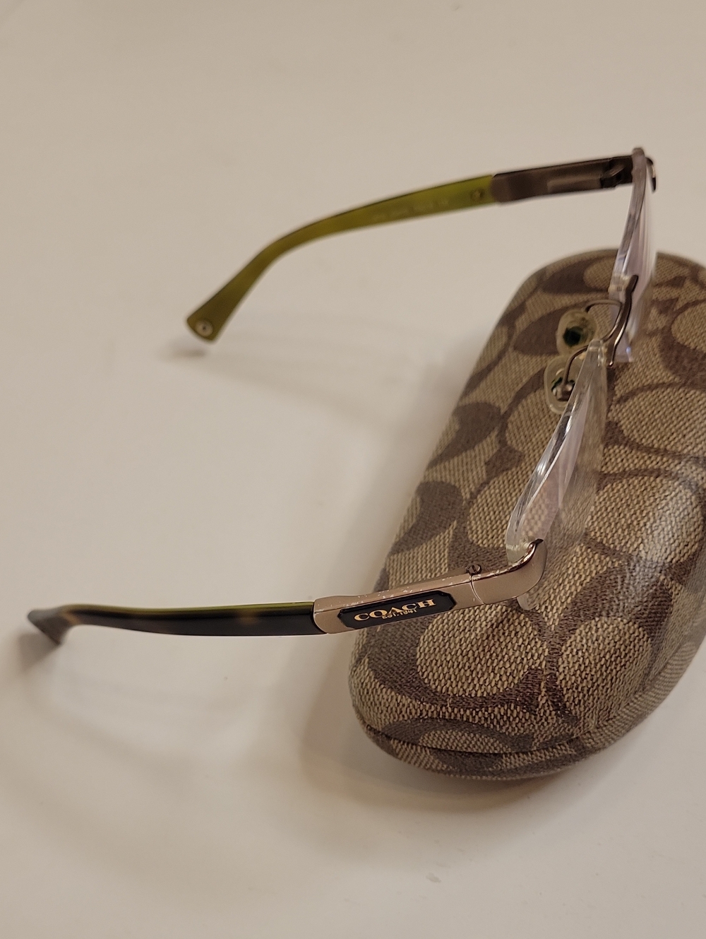 Coach Rimless Eyeglass Frames with Olive Green and Black Temples